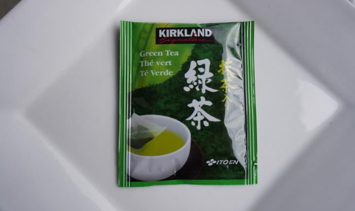 Kirkland Signature Green tea bag on white plate