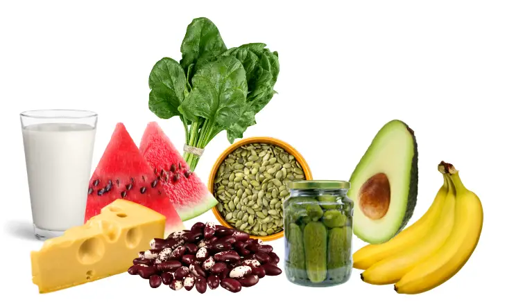 Image of a variety of foods and drinks that are high in electrolytes, including bananas, avocado, beans, cheese, and watermelon.