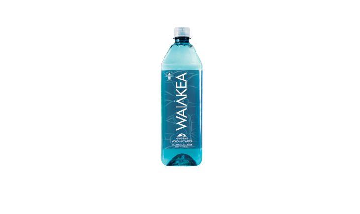 A bottle of Waiākea Volcanic Water, sourced from the ancient lava fields of Hawaii.