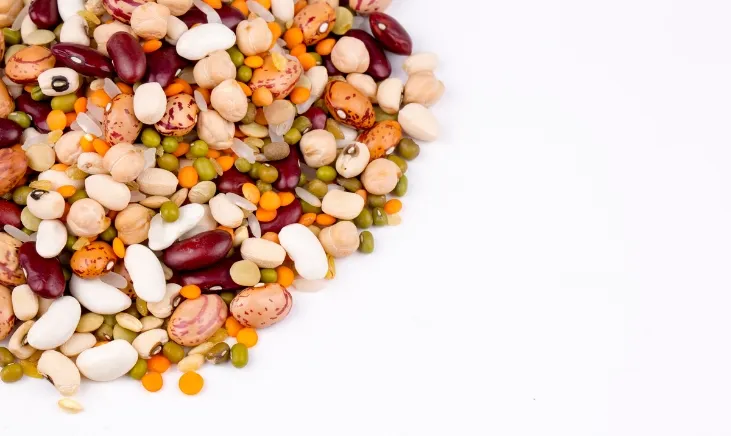Colorful assortment of legumes, including lentils and chickpeas