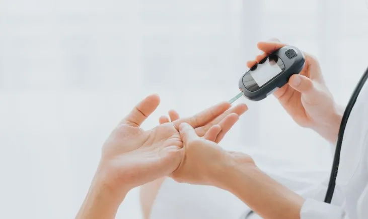 Physician monitoring blood glucose levels