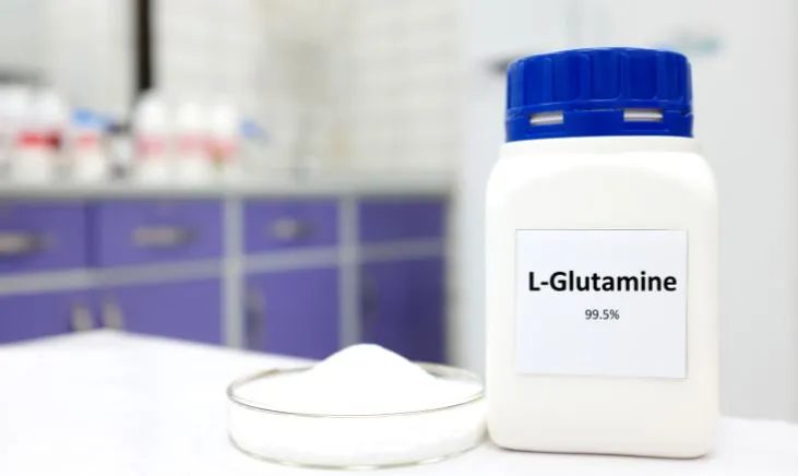 White bottle containing essential Glutamine supplement