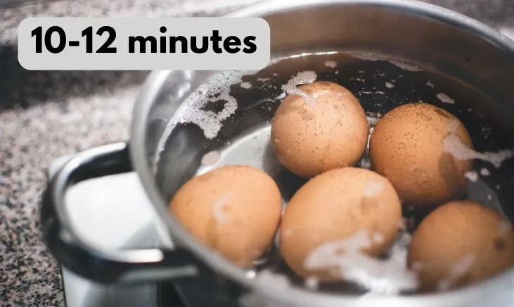 Eggs in bubbling hot water